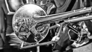 Brass instruments arranged in a repeating pattern